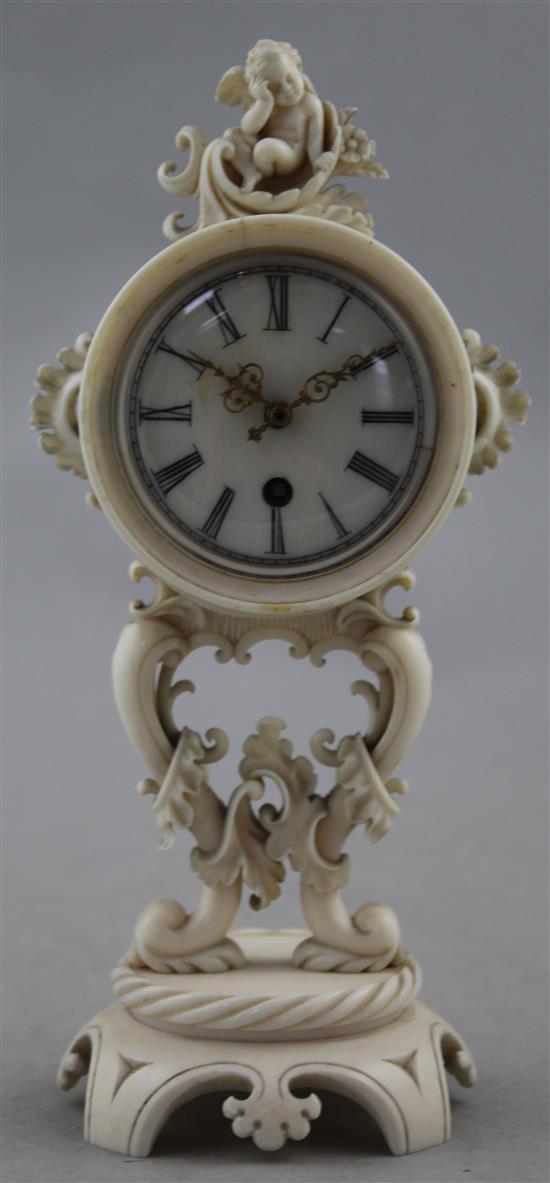 A 19th century French carved ivory boudoir timepiece, 6.5in.